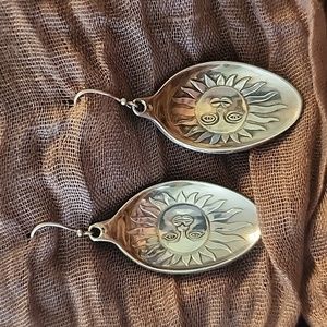 Stunning handcrafted sterling silver sun earrings.